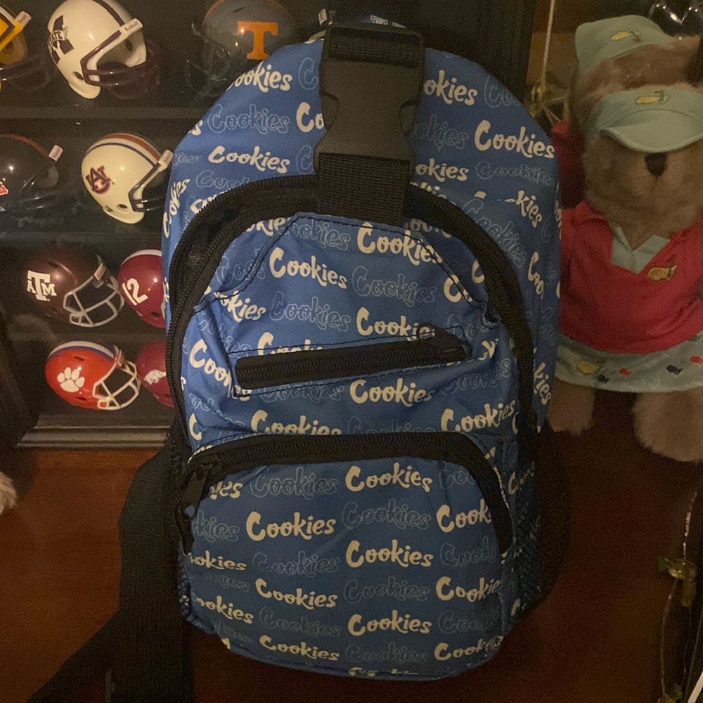 “Cookies” messenger bag. Vinyl front with the bl/wt font. Can fit up to an iPad.